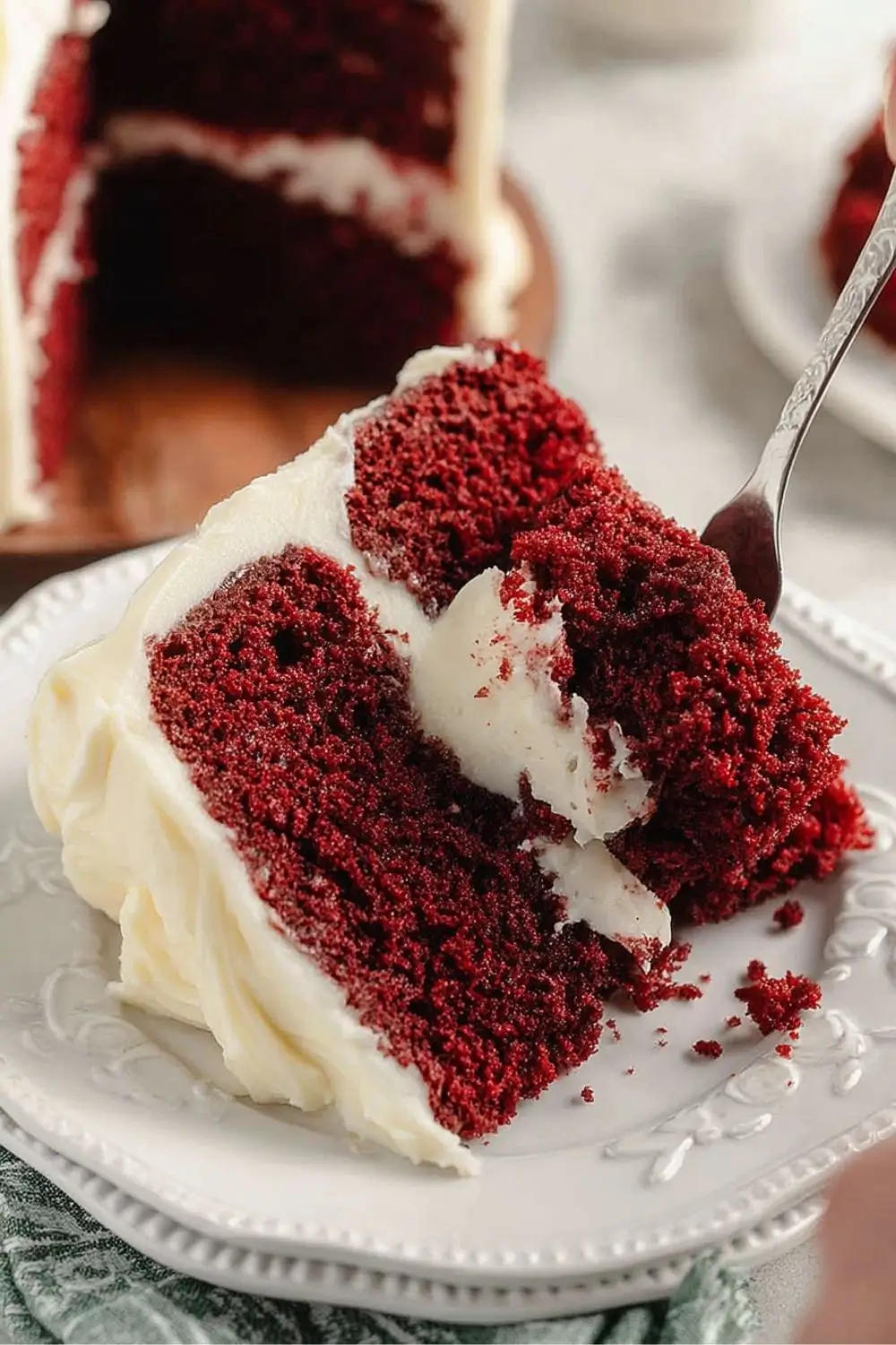 gluten free red velvet cake recipe on cake stand in rustic kitchen
