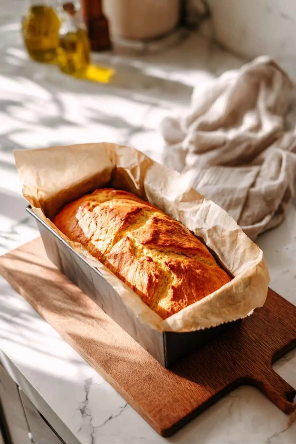 baked-gluten-free-egg-free-dairy-free-bread gluten free egg free bread recipe, Loaf of gluten free egg free dairy free bread in parchment-lined pan