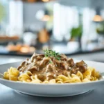 Recipe for Gluten Free Beef Stroganoff – Creamy, Easy, Classic 3 Plated gluten free beef stroganoff with creamy sauce